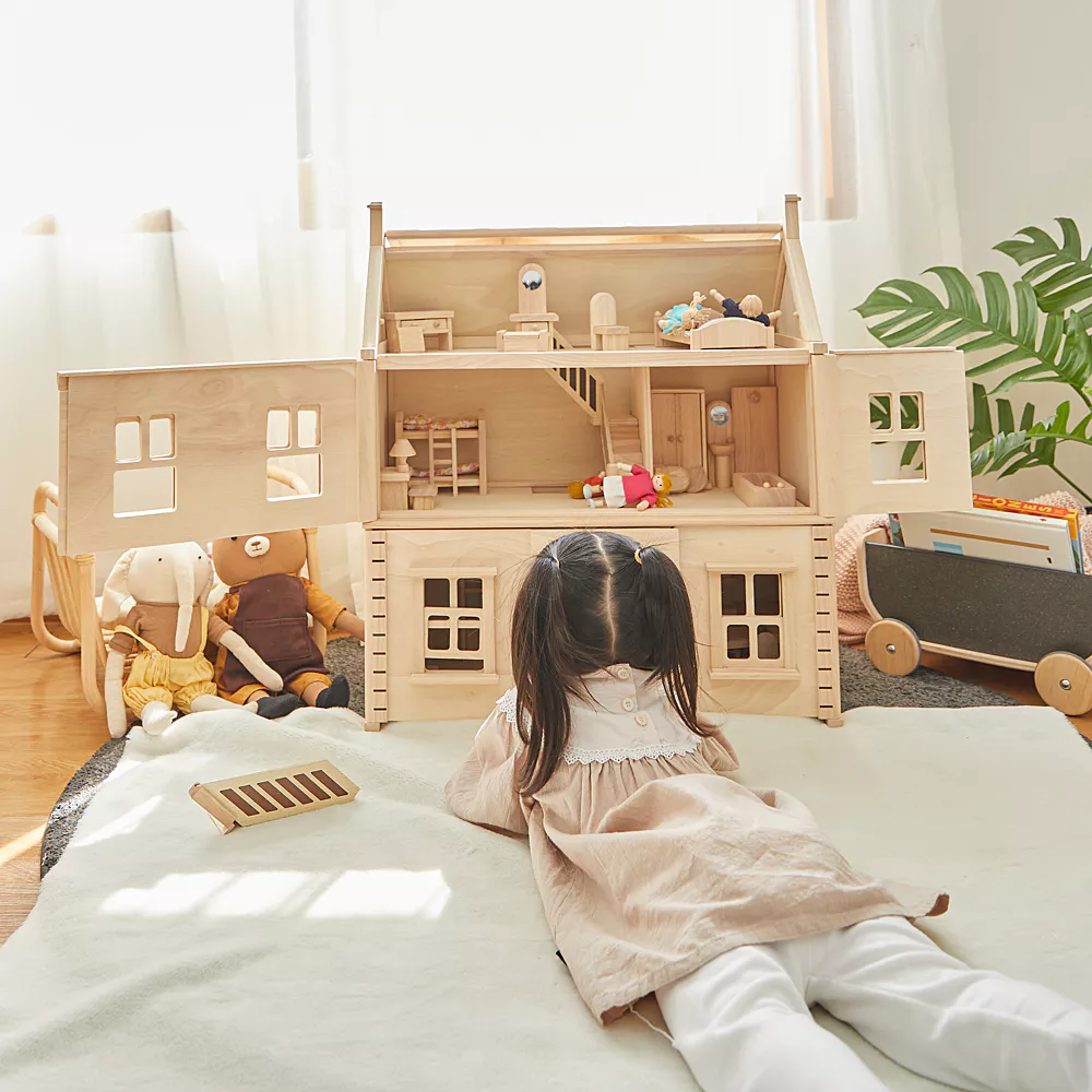 Maison de poupées en bois de la marque Plan Toys